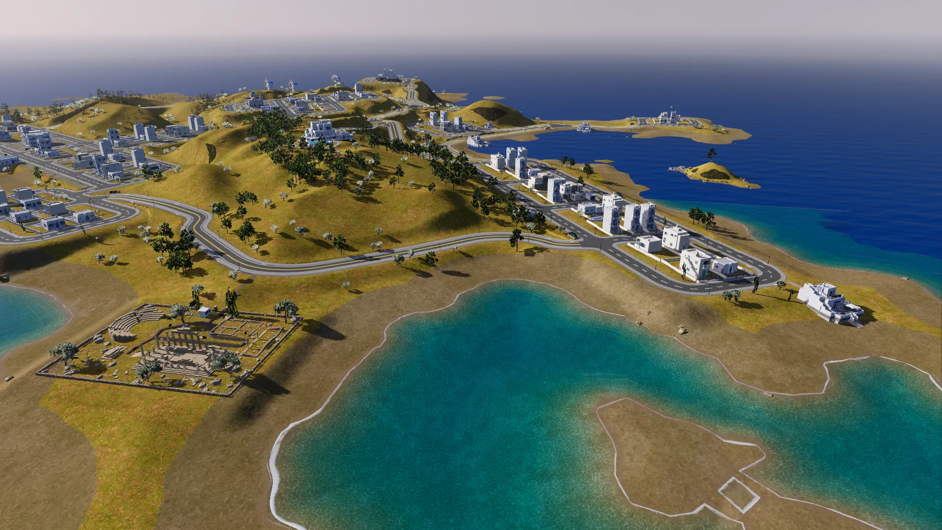 Cliffside's terraced houses and the ancient ruins above a sheltered turquoise cove