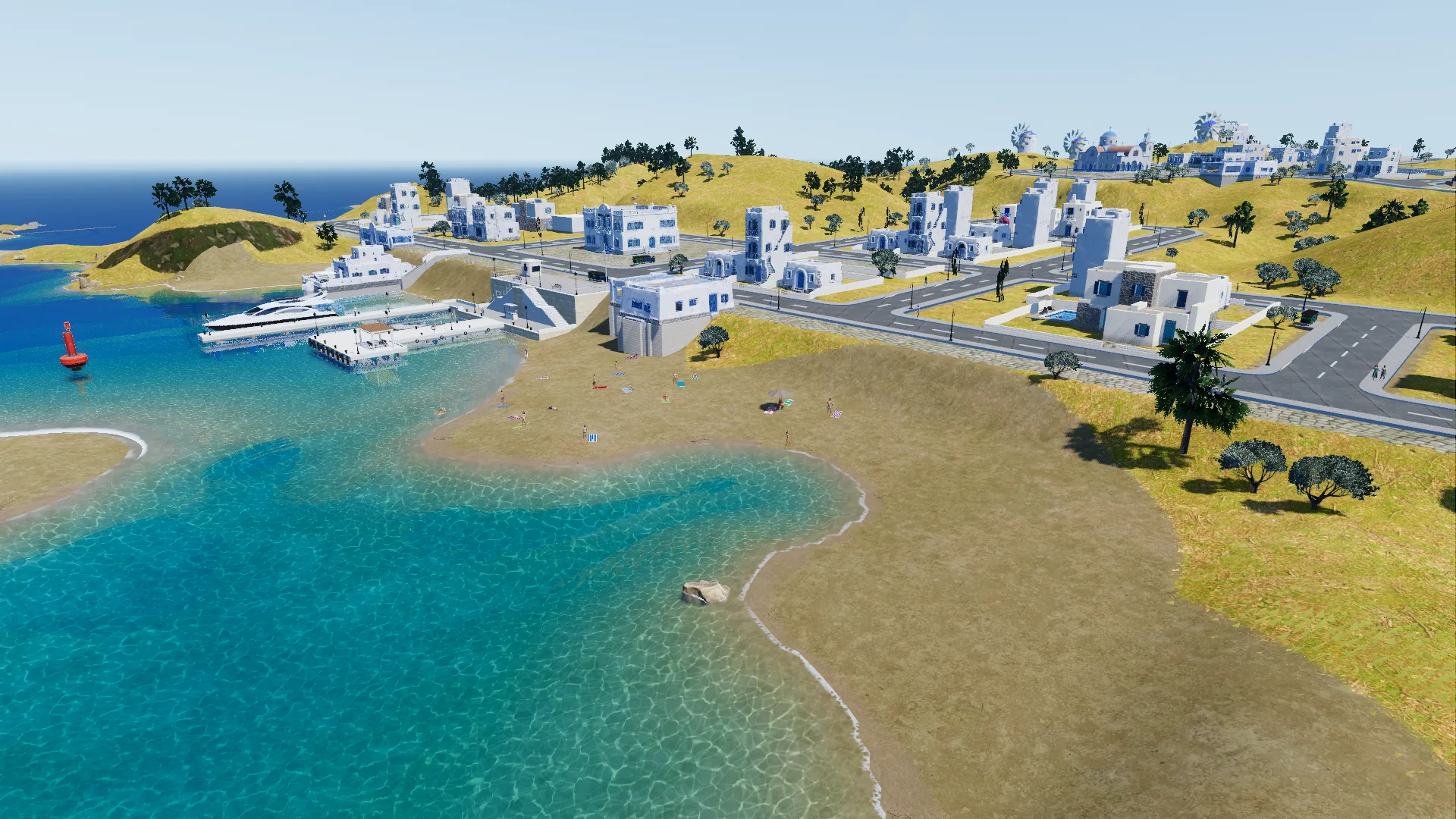 Low aerial over the Family Quarter beach and harbour: clear shallow water and white houses along the shore