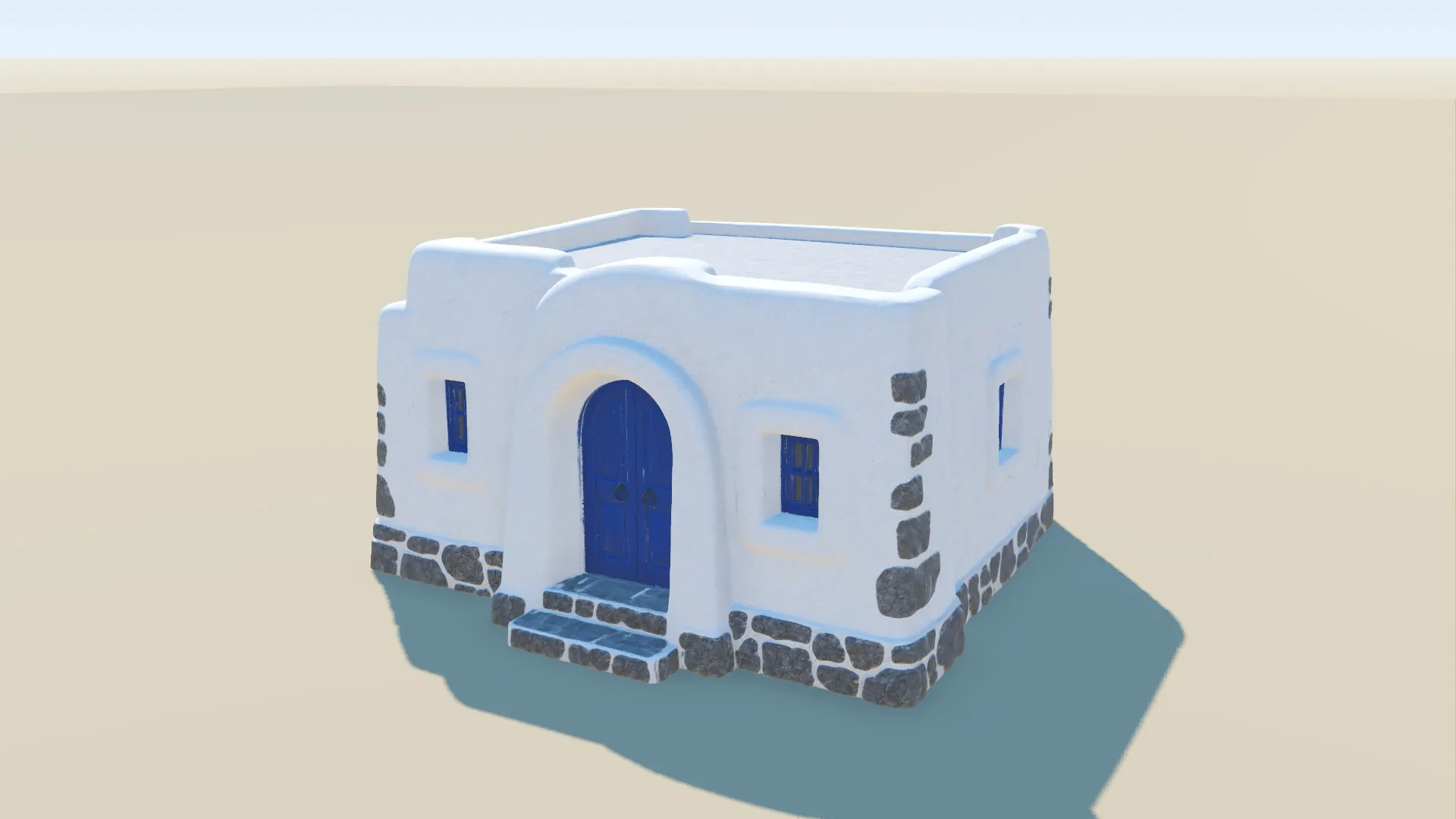 Cycladic house with an arched blue door and stone trim