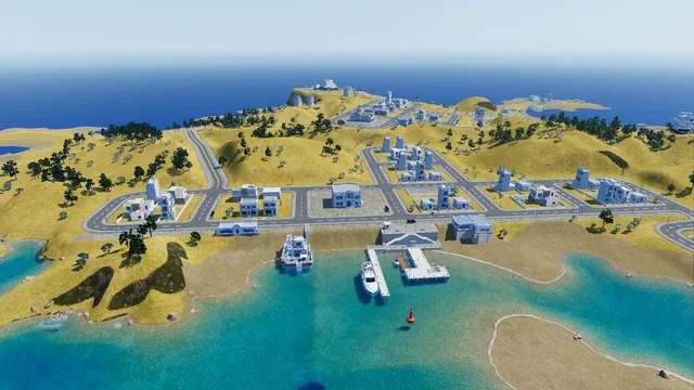 Aerial view of the harbour: town hall square, whitewashed houses, the pier with a moored yacht and a seaside restaurant