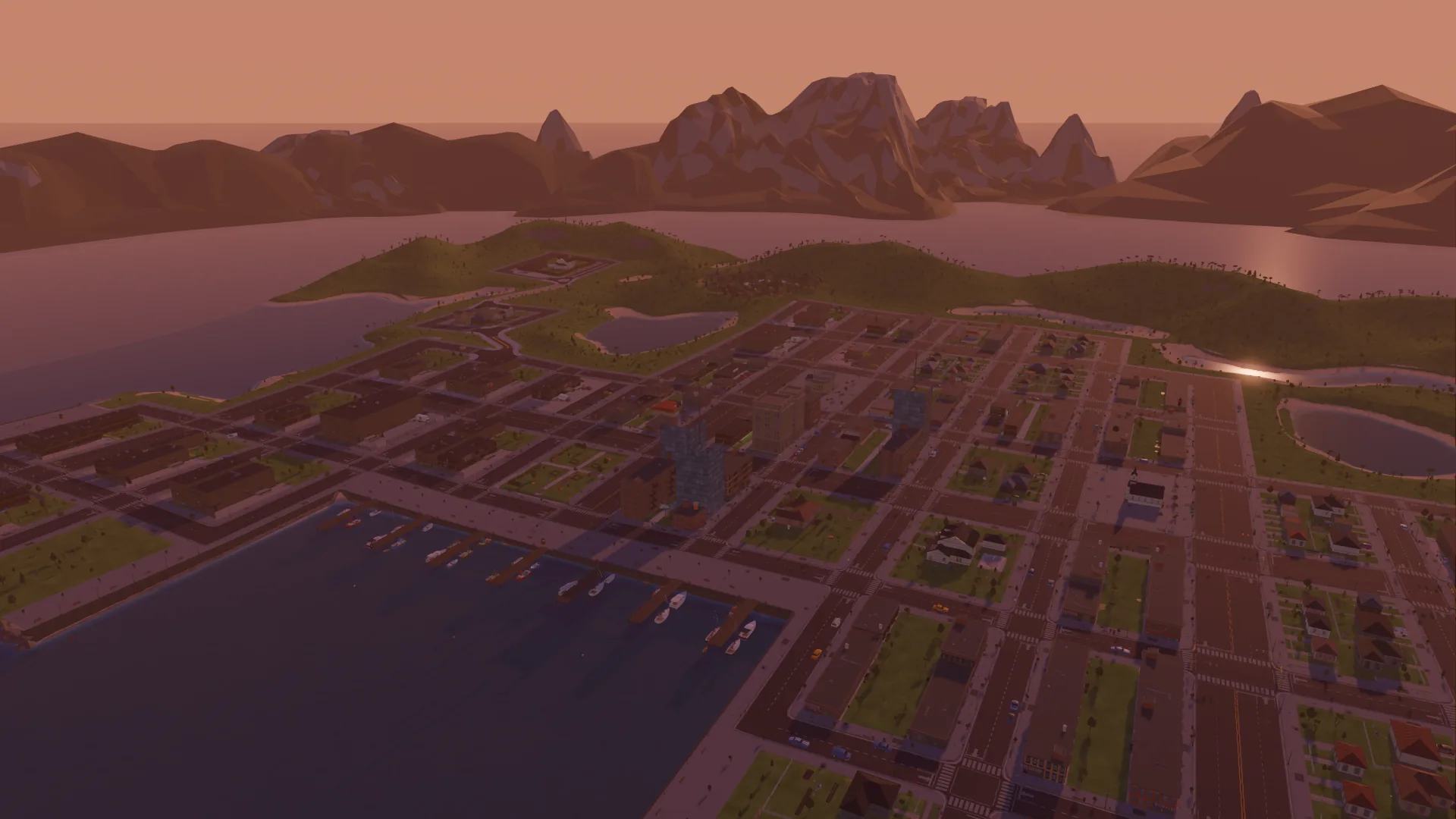 The town at sunset seen from above the marina, boats at the piers and low-poly mountains across the bay